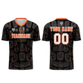 Conjunto personalizado de camiseta de fútbol negra y naranja para niños y adultos