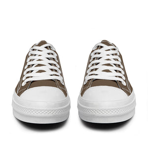 Resalta tu estilo con las zapatillas bajas de lona Lion para hombre y mujer