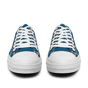 Resalta tu estilo con las zapatillas bajas de lona Lion para hombre y mujer