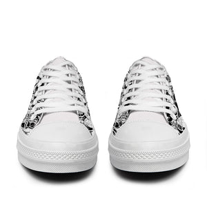 Resalta tu estilo con las zapatillas bajas de lona Skeleton para hombre y mujer