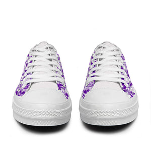 Resalta tu estilo con las zapatillas bajas de lona Skeleton para hombre y mujer