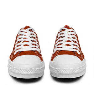 Resalta tu estilo con las zapatillas bajas de lona Lion para hombre y mujer