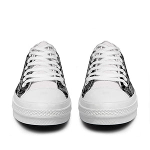 Resalta tu estilo con las zapatillas bajas de lona Skeleton para hombre y mujer