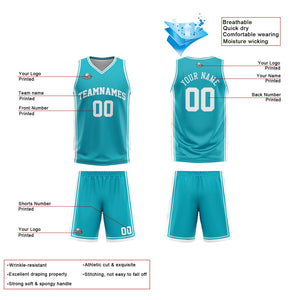 Traje de baloncesto reversible personalizado en cian y blanco para adultos y niños