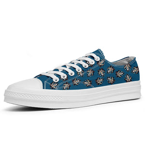 Resalta tu estilo con las zapatillas bajas de lona Lion para hombre y mujer