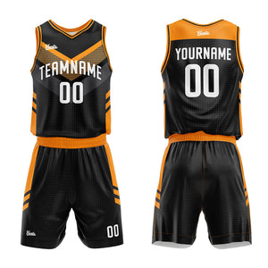 Uniforme de baloncesto personalizado en negro y naranja con tu logotipo-nombre y número impresos