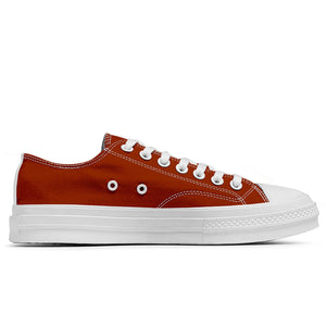 Resalta tu estilo con las zapatillas bajas de lona Lion para hombre y mujer