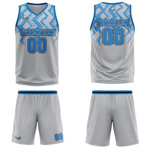 Uniforme de baloncesto personalizado en gris y azul con tu logotipo-nombre y número impresos