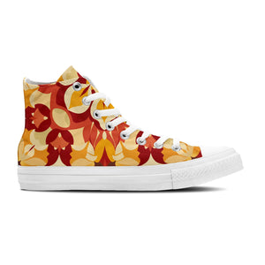 Recorre las calles con un estilo inigualable gracias a nuestras zapatillas de lona de corte medio-que presentan intrincados diseños de inspiración marroquí en una vibrante paleta de rojos-amarillos y verdes