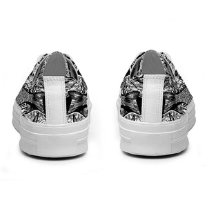 Resalta tu estilo con las zapatillas bajas de lona Fish para hombre y mujer