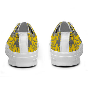 Resalta tu estilo con las zapatillas bajas de lona Skeleton para hombre y mujer