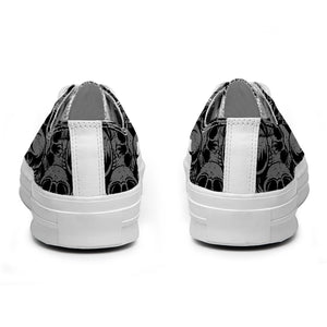 Resalta tu estilo con las zapatillas bajas de lona Skeleton para hombre y mujer