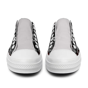 Resalta tu estilo con las zapatillas bajas de lona Skeleton para hombre y mujer