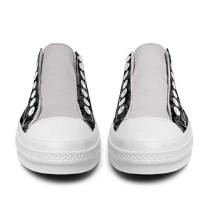 Resalta tu estilo con las zapatillas bajas de lona Skeleton para hombre y mujer